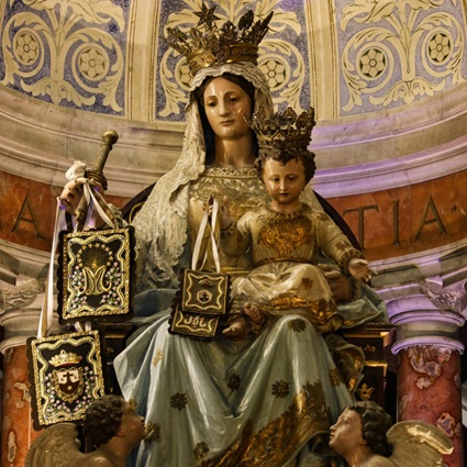 Our Lady of Mount Carmel The Blessed Virgin Mary gave the Brown Scapular to Saint Simon Stock and entrusted the devotion to him on July 16, 1251.